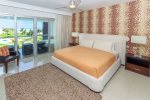 1st master suite with king bed, ocean view, HDTV with satellite and DVD player